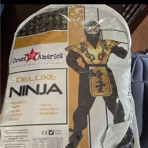 Deluxe ninja costume size 12-14 large.new